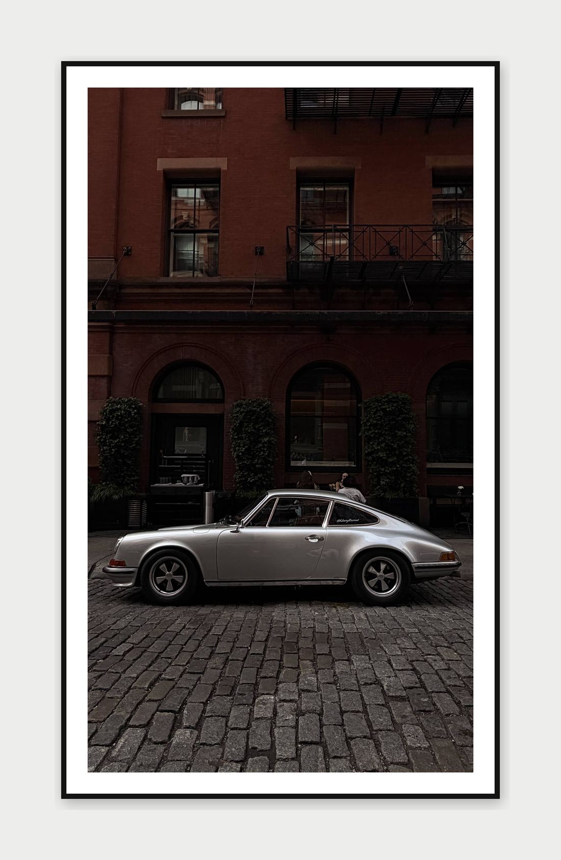 Framed print: a vintage Porsche parked on a cobblestone street, SoHo, New York