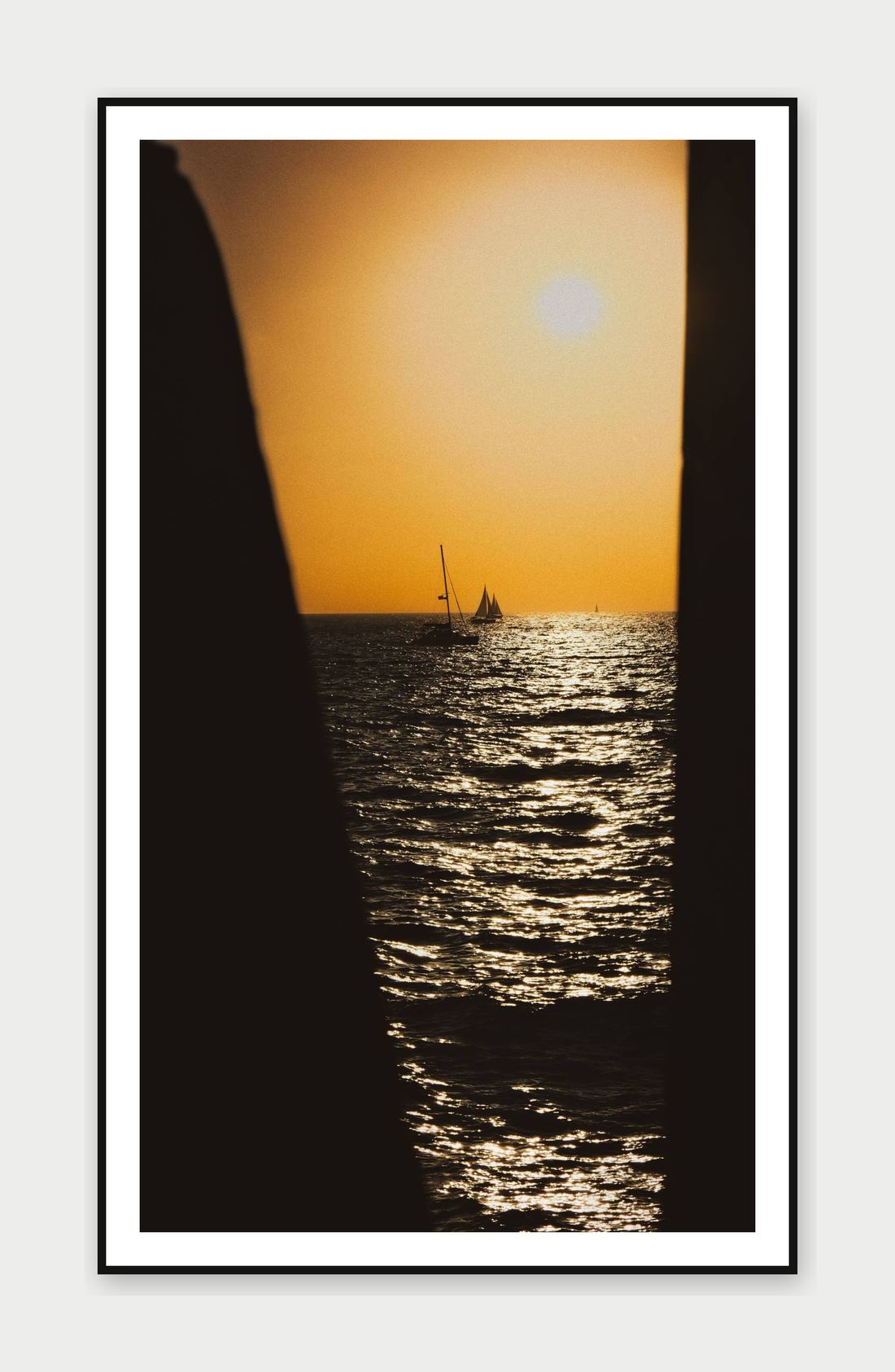 Framed print: sailboats silhouetted against a golden sunset, Tel Aviv, Israel